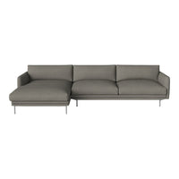 Stylish gray sectional sofa with a modern design and plush cushions, featuring a sleek metal base.