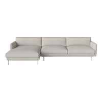 Light gray sectional sofa with smooth fabric and minimalist design, featuring simple lines and no distinct patterns.