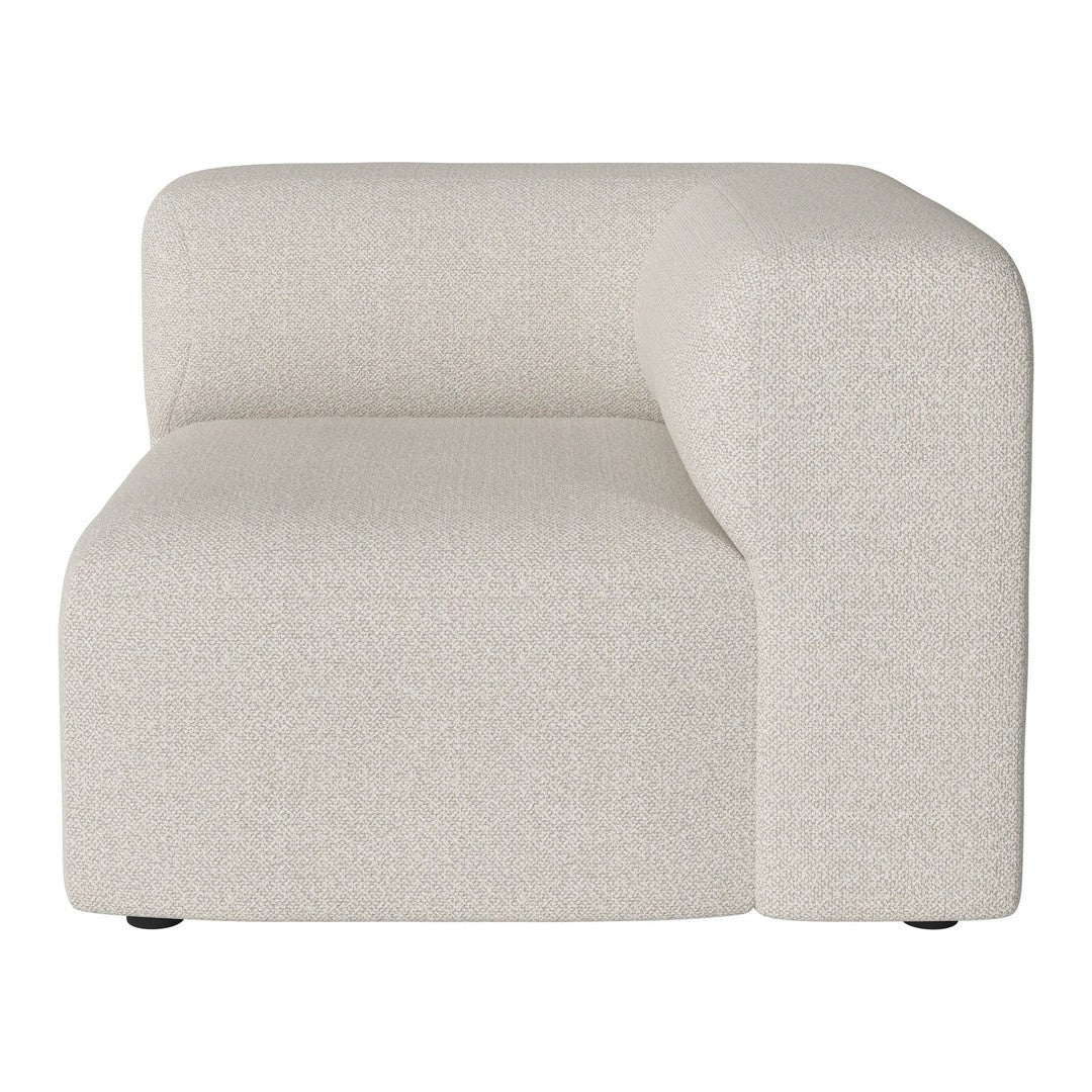 Cream-colored upholstered modular sofa with a smooth, minimalist design and subtle textured pattern.