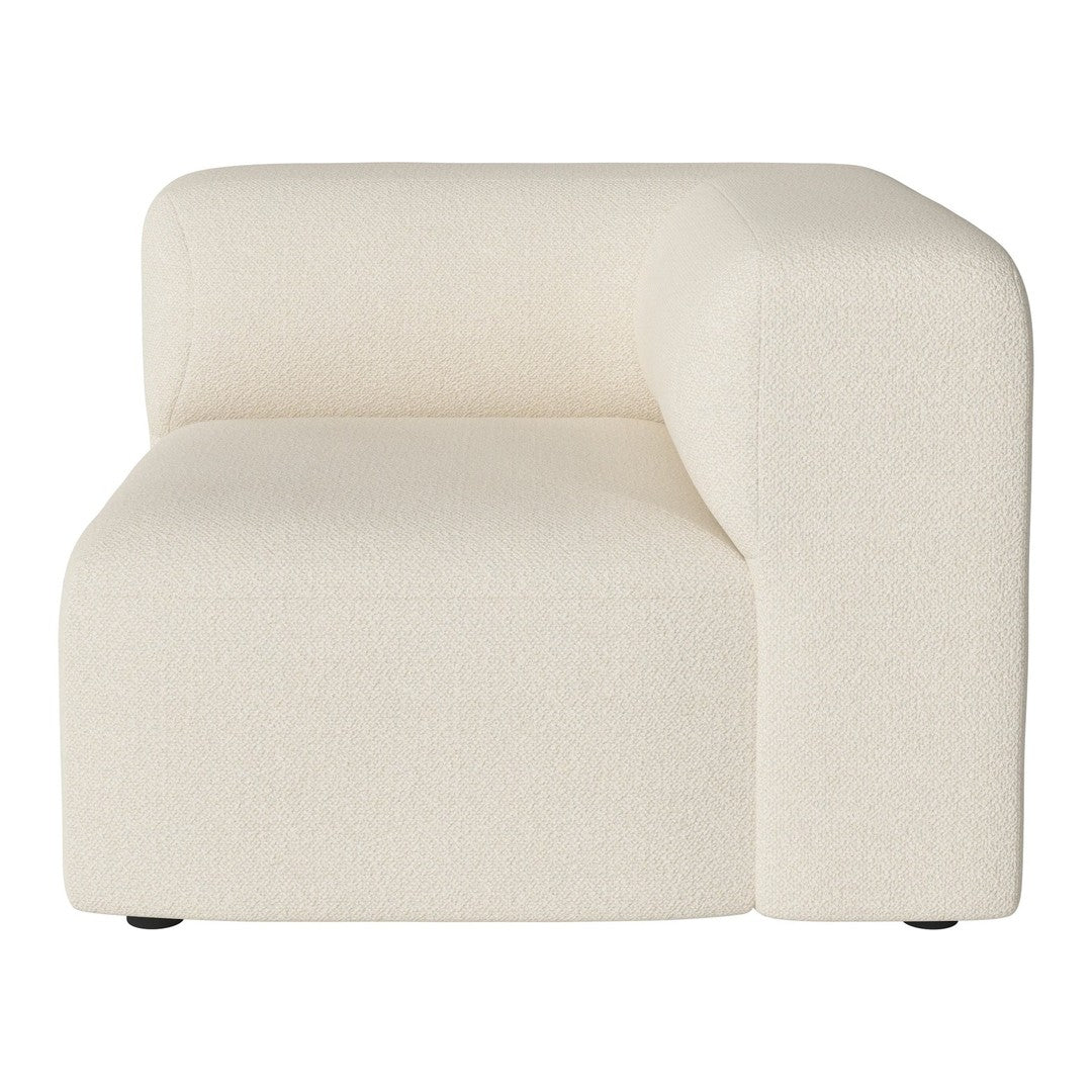 "Modern cream-colored fabric sofa with a minimalist design and textured surface."