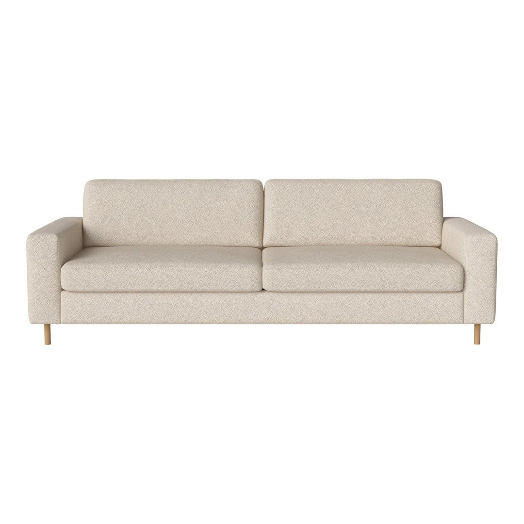 Light beige sofa with a smooth texture and minimalistic design, featuring clean lines and sturdy wooden legs.