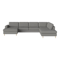 Gray sectional sofa with clean lines and wooden legs, featuring a solid color upholstery for a modern look.