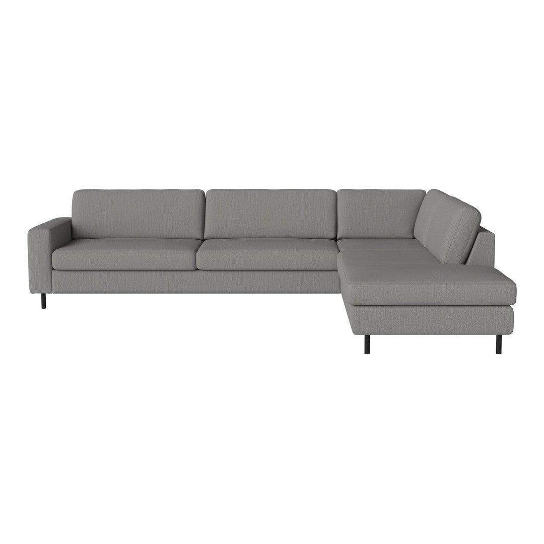 Gray sectional sofa with a sleek, minimalist design and clean lines, perfect for modern living spaces.