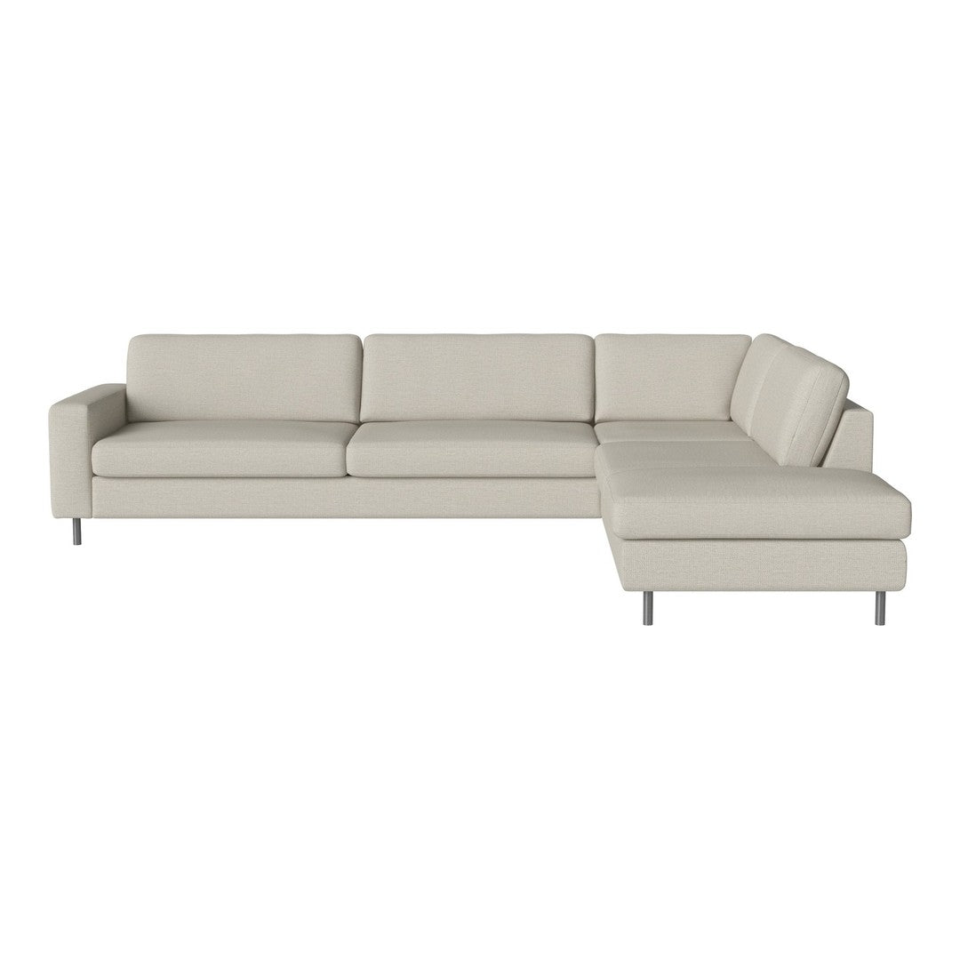 Modern light gray sectional sofa with clean lines and subtle texture, perfect for contemporary living spaces.