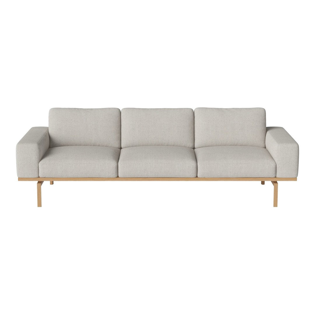 Light gray fabric sofa with clean lines and wooden legs, perfect for modern living spaces.