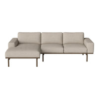 Neutral beige sectional sofa with a minimalist design and sleek brown metal legs. Perfect for modern interiors.