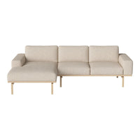 Light beige sofa with a minimalist design, featuring smooth fabric and natural wood accents. No patterns.