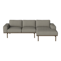 Gray fabric sectional sofa with clean lines and a minimalist design, featuring a sleek bronze frame.