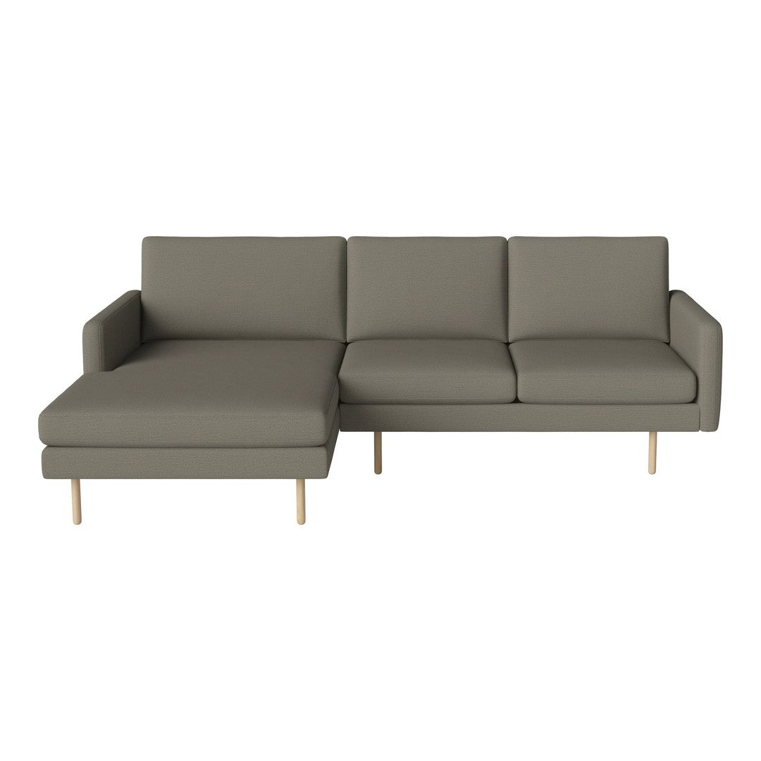 Modern grey sectional sofa with clean lines and minimalistic design, featuring solid wooden legs. Perfect for stylish interiors.