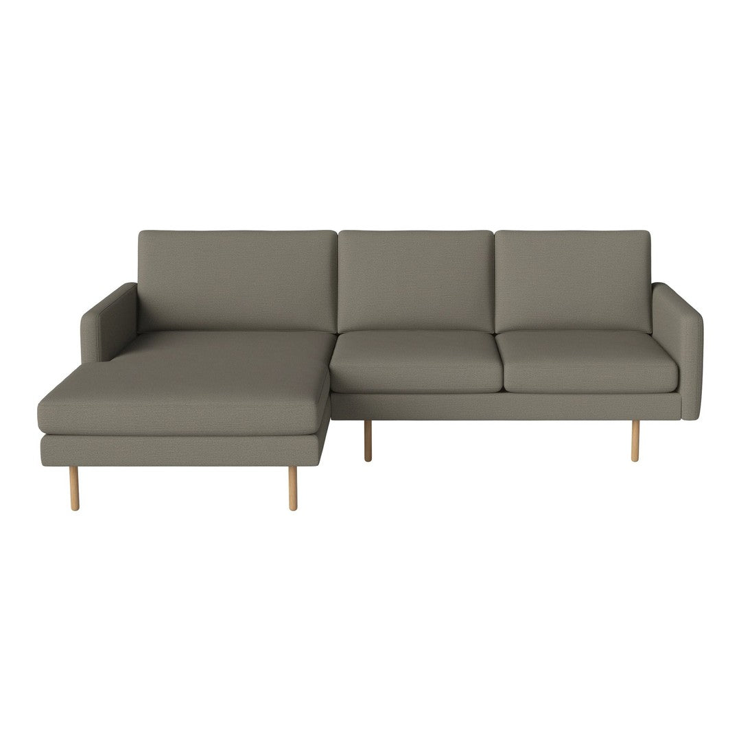 Modern gray sectional sofa with clean lines and minimalist design, featuring solid wood legs and cushioned seating.