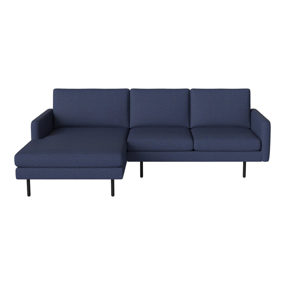 Navy blue sectional sofa with a minimalist design and clean lines, perfect for modern living spaces.