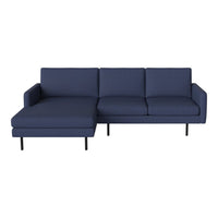 Navy blue sectional sofa with a minimalist design and clean lines, perfect for modern living spaces.