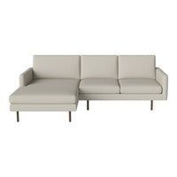 Modern light gray sectional sofa with clean lines and minimalistic design. Perfect for contemporary living rooms.