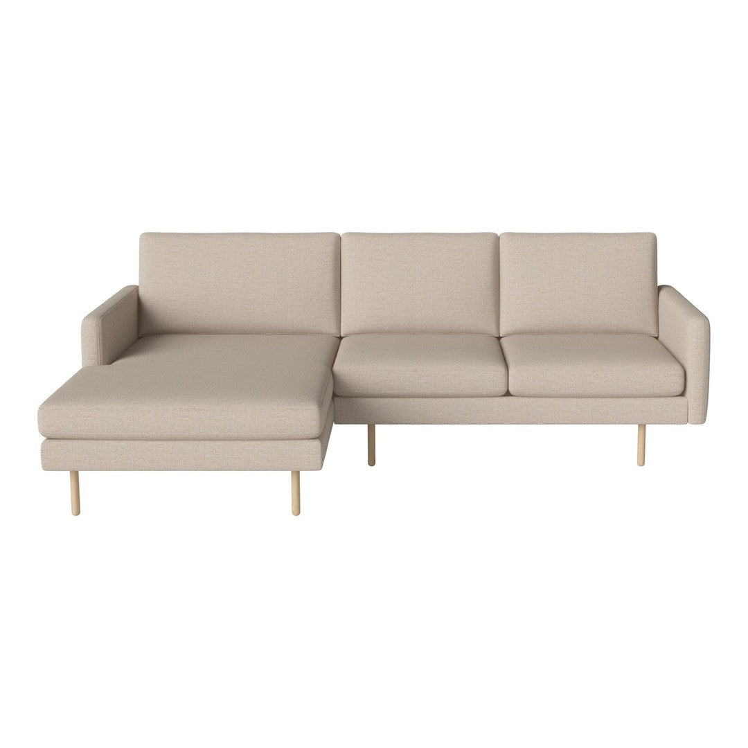 Beige sectional sofa with minimalist design, featuring solid light wood legs and smooth upholstery. Perfect for modern decor.