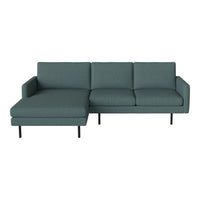 Teal fabric chaise lounge sofa with subtle vertical stripes. Modern minimalist design with black metal legs.