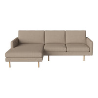Beige sectional sofa with clean lines and subtle texture, featuring wooden legs for a modern touch.