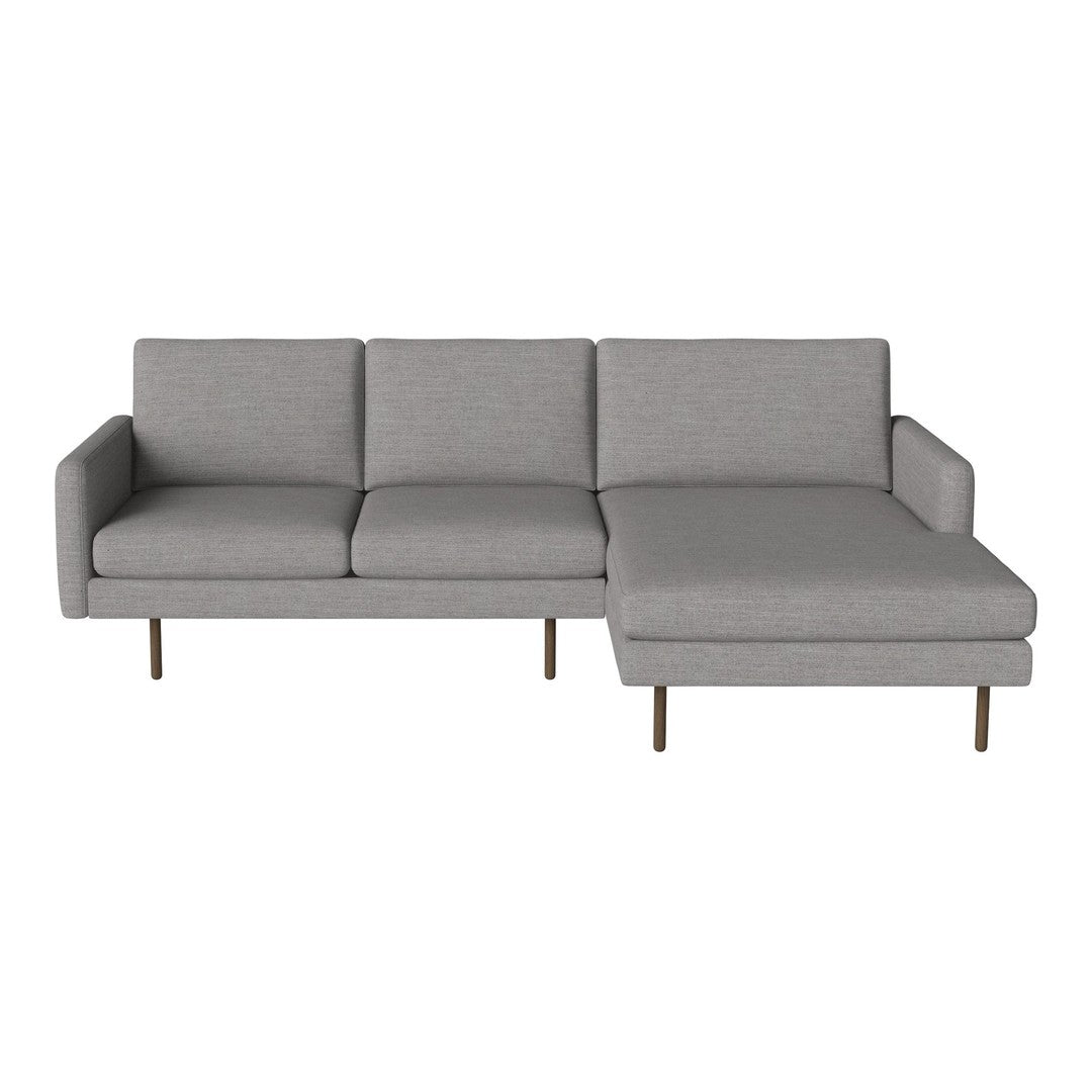 Light gray sectional sofa with a sleek modern design and clean lines, featuring a solid fabric finish.