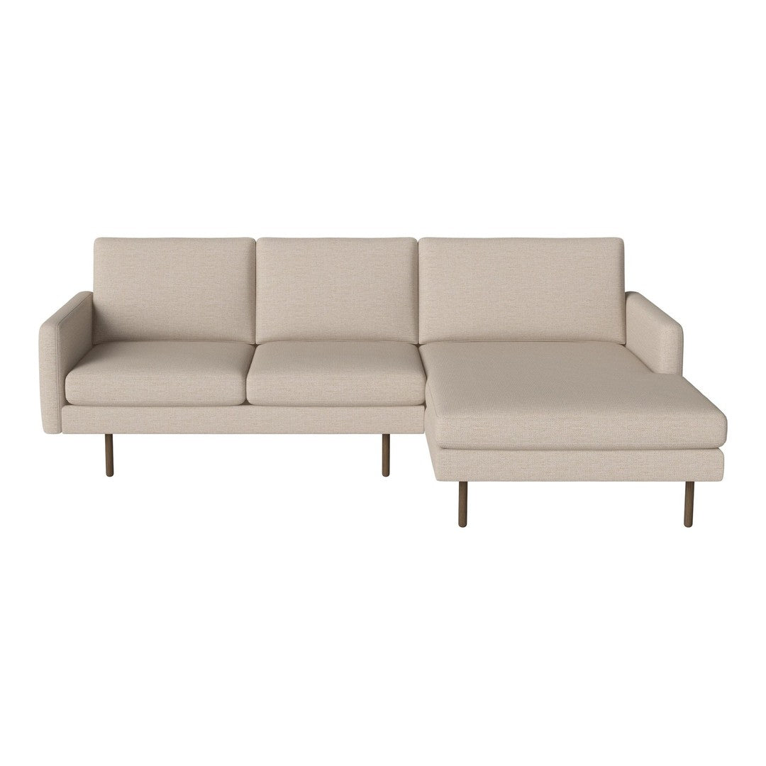 "Light beige modern sectional sofa with clean lines and a minimalist design."