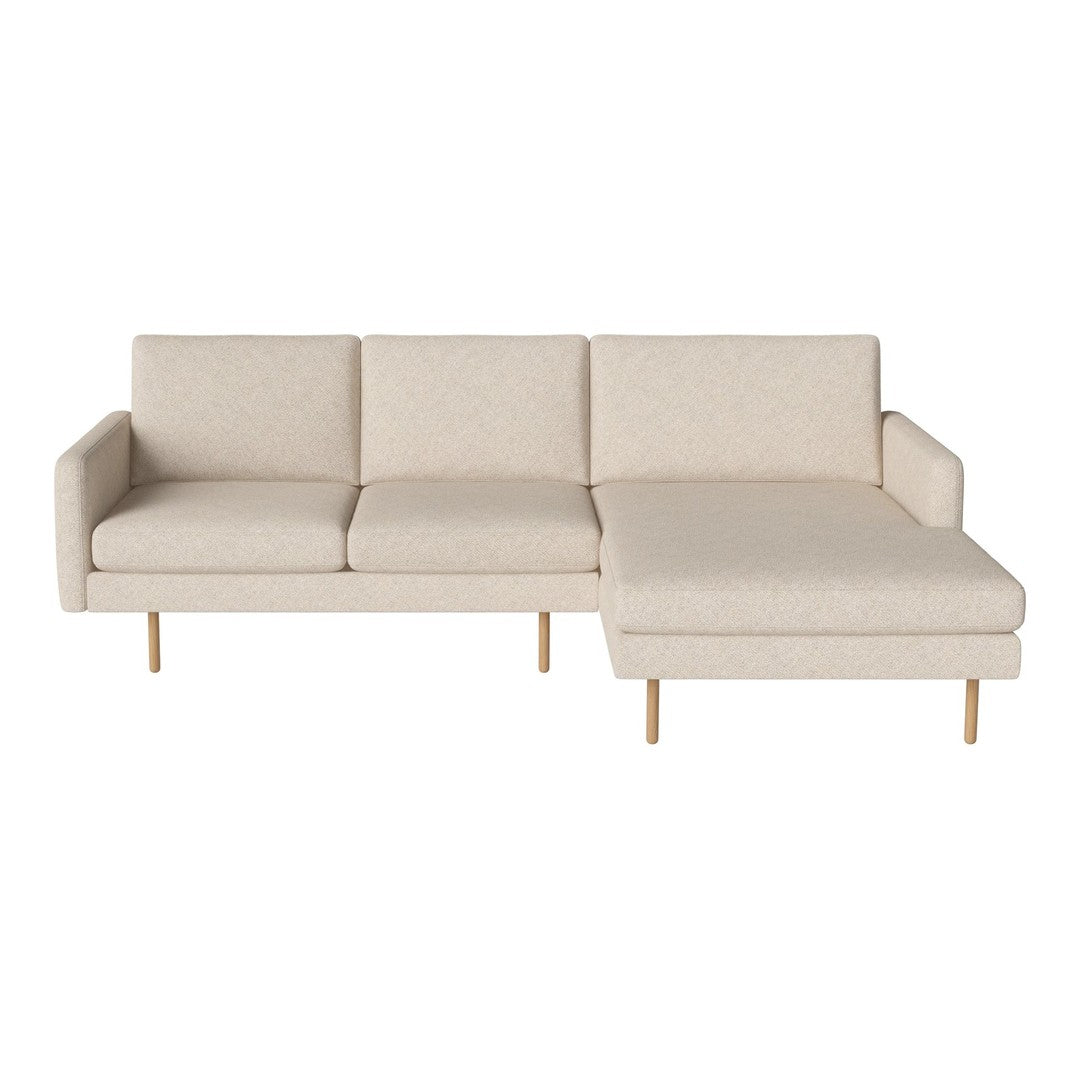 Light beige sectional sofa with a smooth fabric texture and minimalist design.