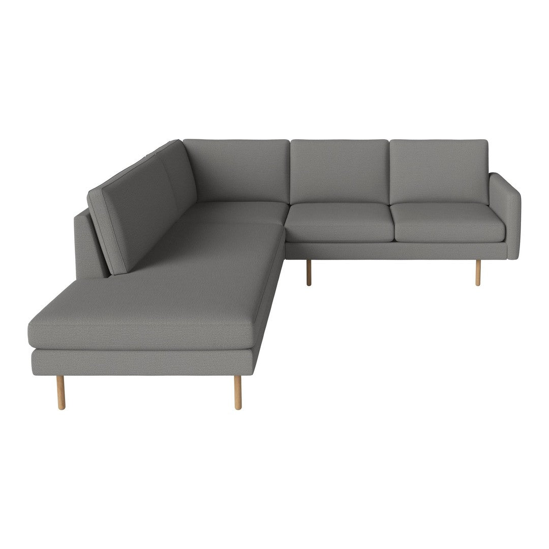 Modern gray sectional sofa with clean lines and soft upholstery, featuring natural wood legs for a sleek contrast.