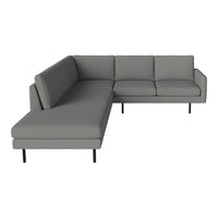 Gray modern sectional sofa with clean lines and no visible patterns, featuring sleek black legs.
