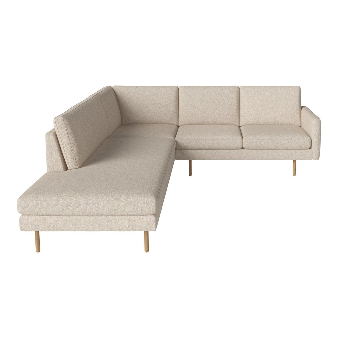 Beige upholstered sectional sofa with a minimalist design and subtle texture, featuring sleek wooden legs.