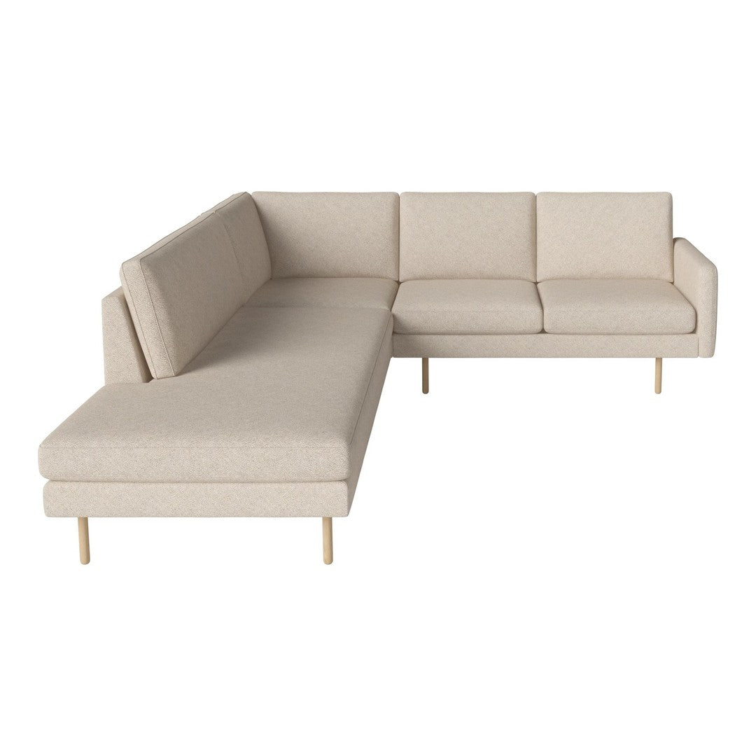 Beige fabric sectional sofa with clean lines and subtle texture, paired with light wooden legs.
