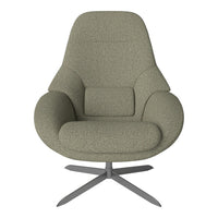 Soft olive green chair with a textured, cozy fabric and a minimalist design. Stylish silver metal base.