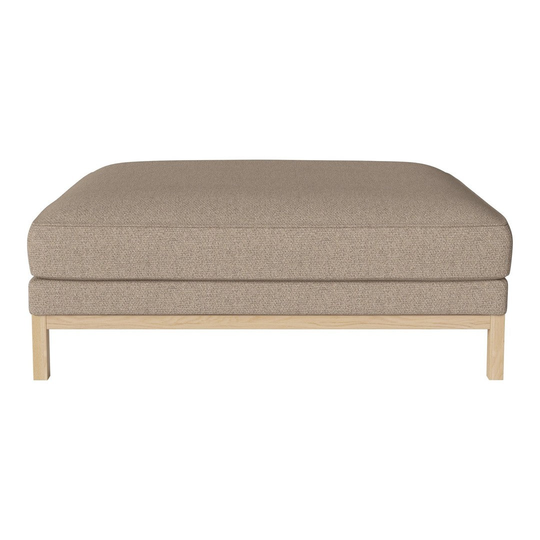 Beige upholstered ottoman with textured fabric and natural wood legs. Clean, minimalist design enhances any decor.