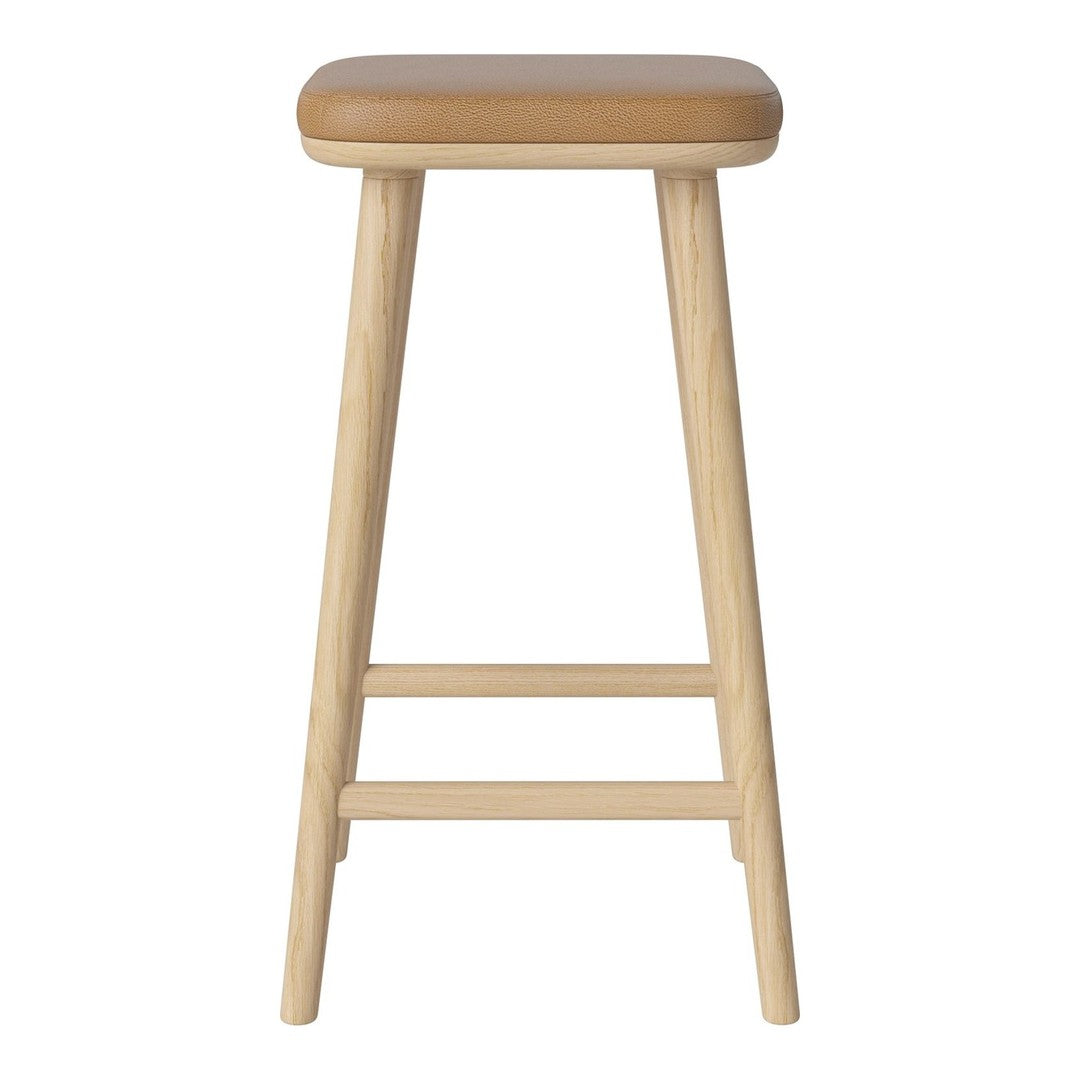 Light wood bar stool with a tan upholstered seat, showcasing a minimalist design and natural color scheme.