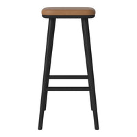 Sleek black metal bar stool with a warm brown leather seat, featuring a minimalistic design and clean lines.