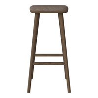 Natural brown wooden bar stool with a textured beige fabric seat, featuring clean lines and a minimalist design.