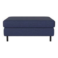 Navy blue upholstered ottoman with a textured fabric and sleek black legs, perfect for modern living spaces.