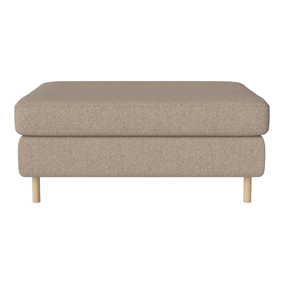 Beige upholstered ottoman with a smooth texture and light wood legs. Simple, modern design ideal for any decor.