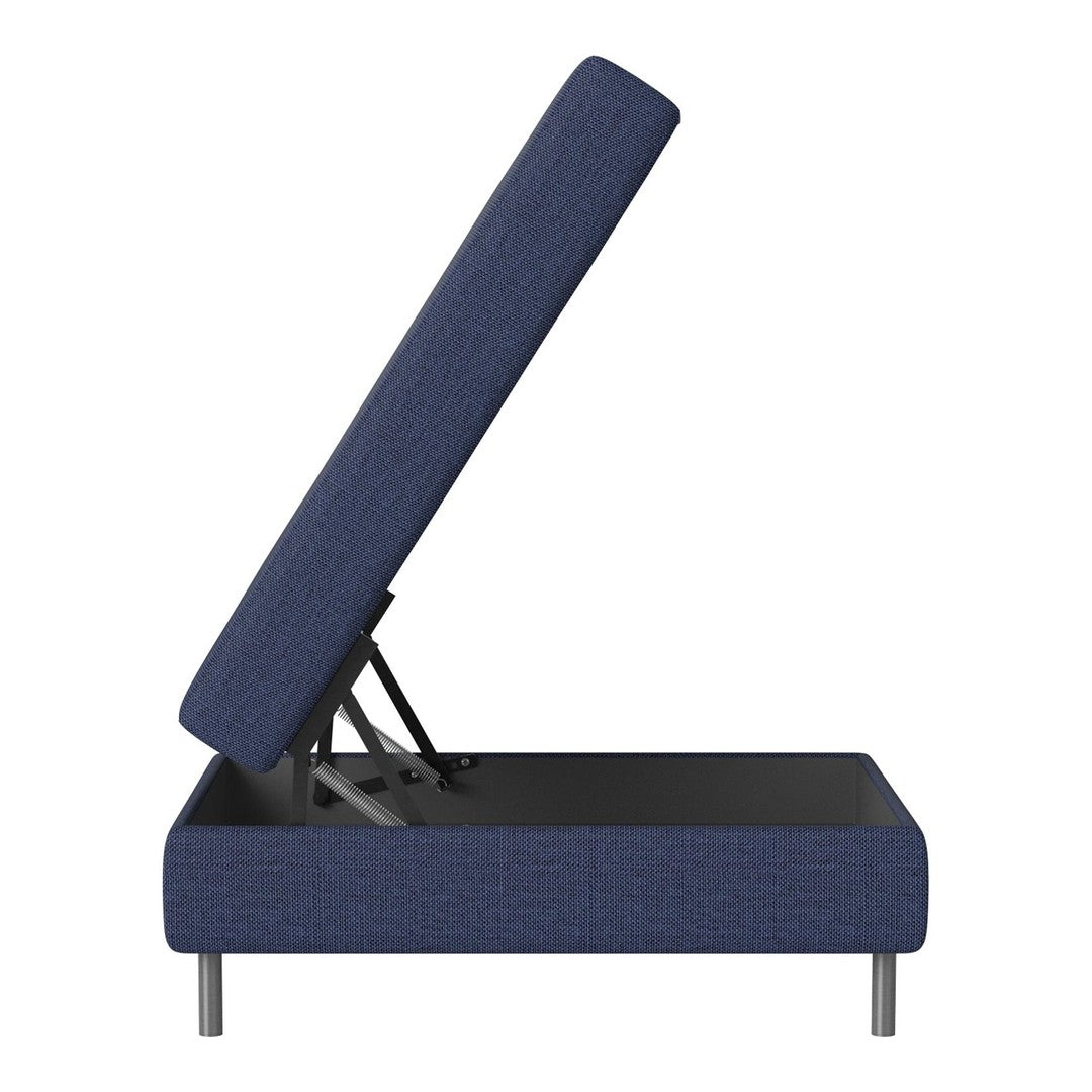 Navy blue upholstered storage bed with a textured pattern, featuring a lift-top design and sleek metal legs.