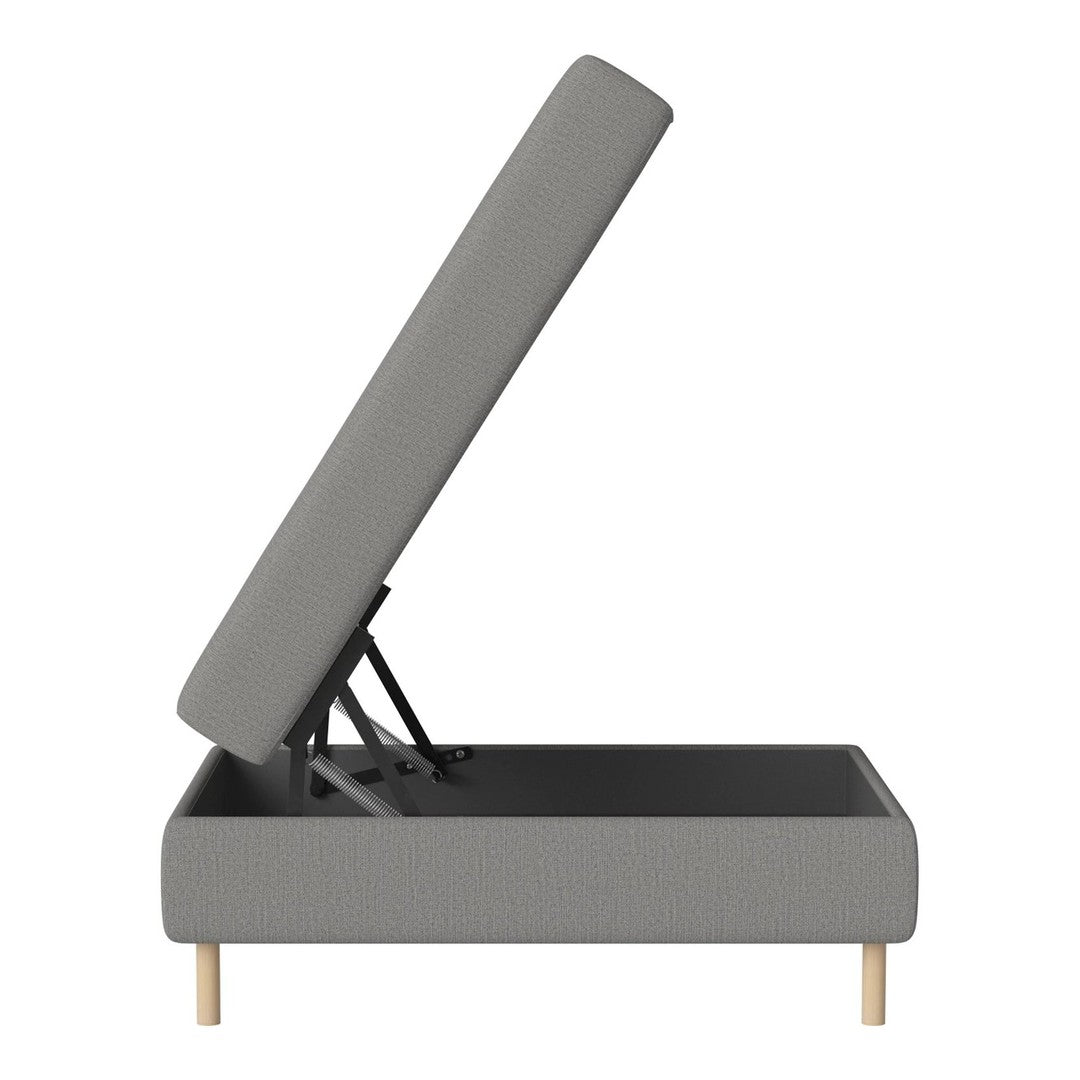 Gray upholstered storage bed with a modern design and light wood legs, featuring a clean, minimalist style.