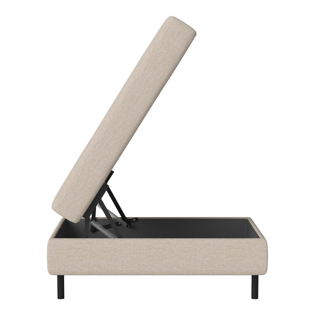 Beige upholstered storage bed with a textured fabric pattern and sleek black metal frame.