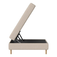 Beige upholstered storage bed with a textured fabric and minimalist design, featuring natural wood legs and a black interior.
