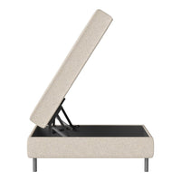 Beige upholstered storage bed with a solid black base, featuring a clean, modern design and simple lines.