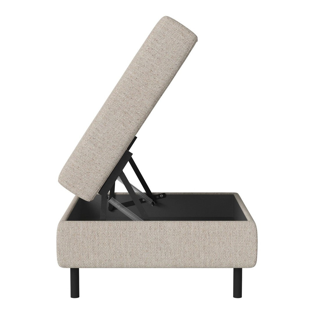 Beige upholstered storage ottoman with a minimalist design and black metal frame, featuring a subtle textured pattern.