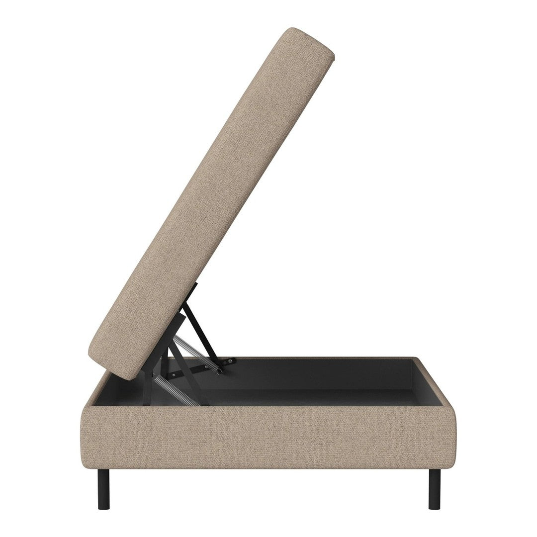 Beige upholstered storage bed with a simple design and black metal frame. Suitable for modern interiors.