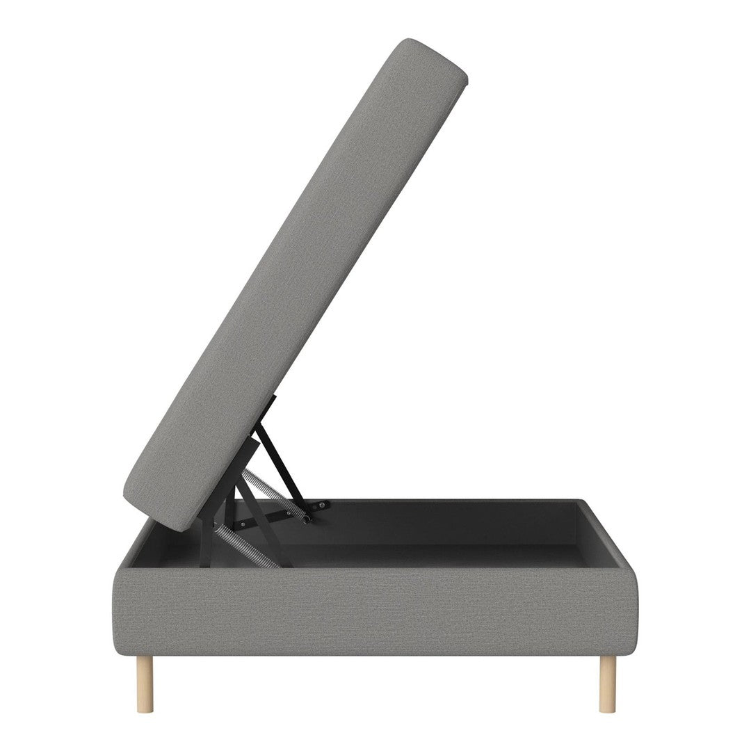 Light gray upholstered storage bed with a minimalist design and natural wood legs, showcasing a simple, modern pattern.