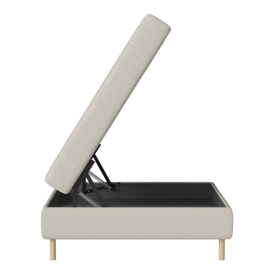 Light beige upholstered storage bed with a textured fabric and natural wood legs, featuring a sleek, modern design.