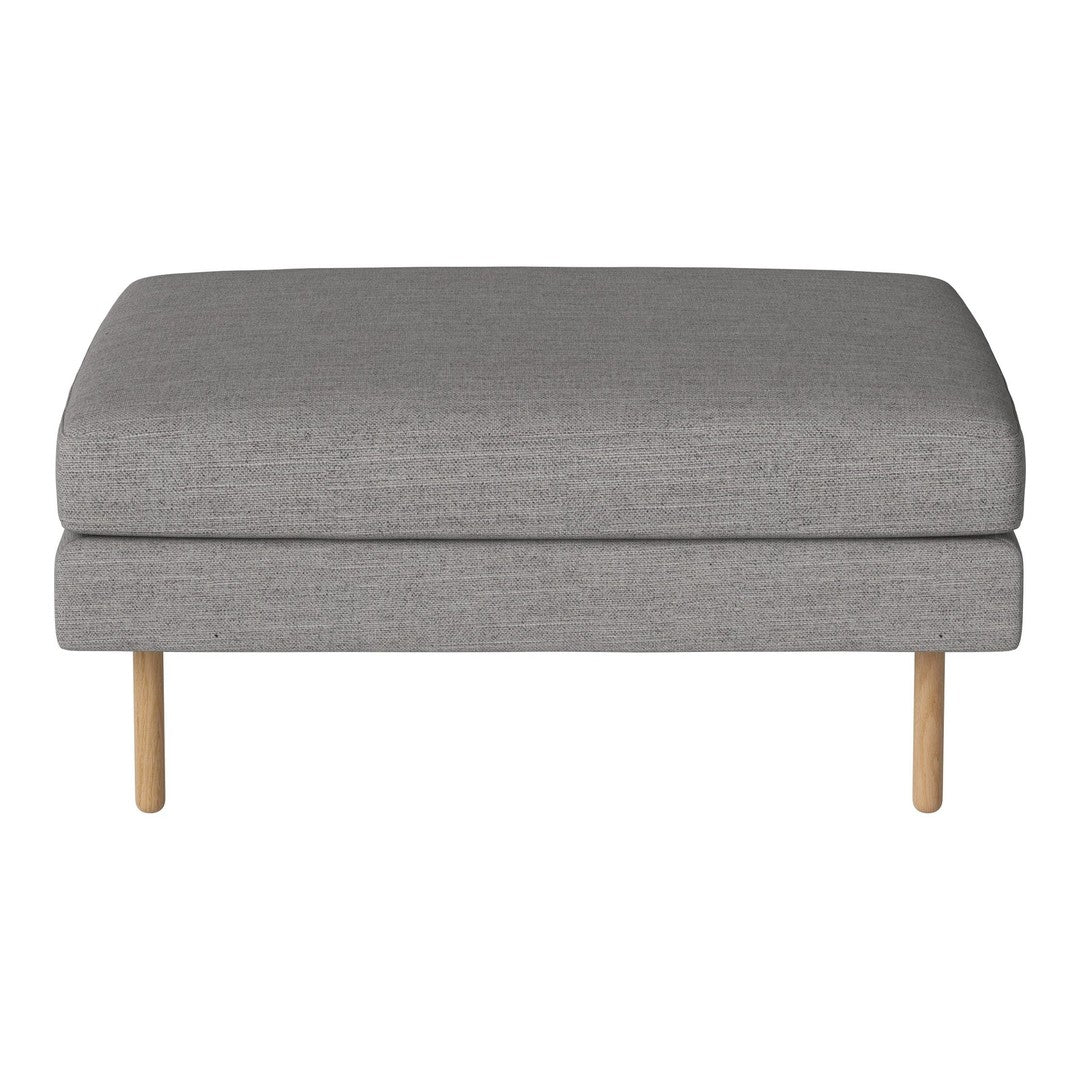Gray fabric ottoman with a smooth texture and natural wooden legs, ideal for modern living spaces.