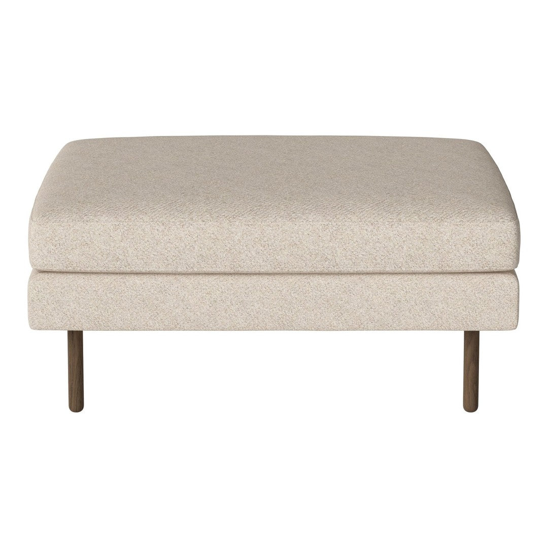 Beige fabric ottoman with subtle textured pattern, complemented by metallic legs for a modern touch.