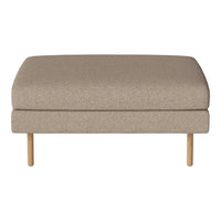 Beige upholstered ottoman with a smooth fabric texture and natural wood legs, perfect for modern decor.