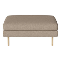 Beige upholstered ottoman with a smooth texture and light wooden legs, perfect for modern decor.