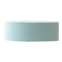 Soft mint green round cushion with a smooth, solid texture. Perfect for cozy decor accents.