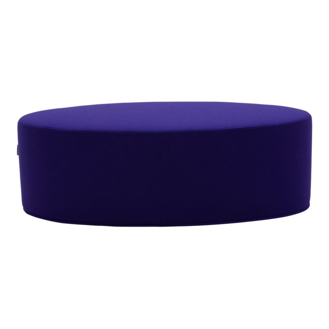 Vibrant purple oval pouf with a smooth, solid texture perfect for modern decor.