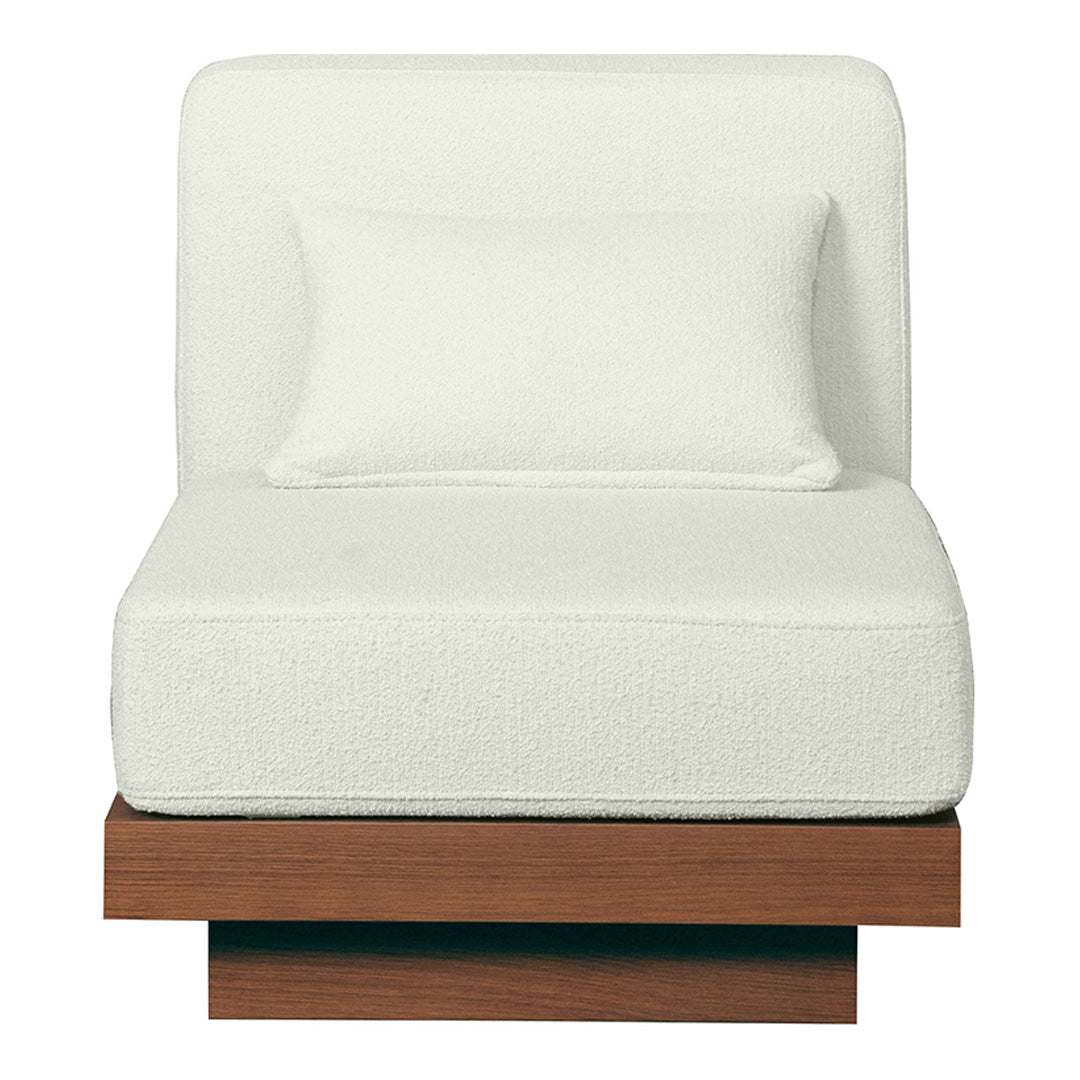 White upholstered chair with a smooth texture and a contrasting wooden base. Modern and minimalistic design.